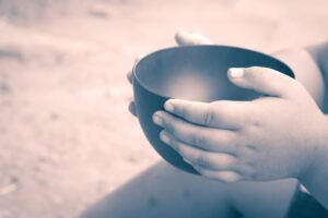 Small hands empty bowl